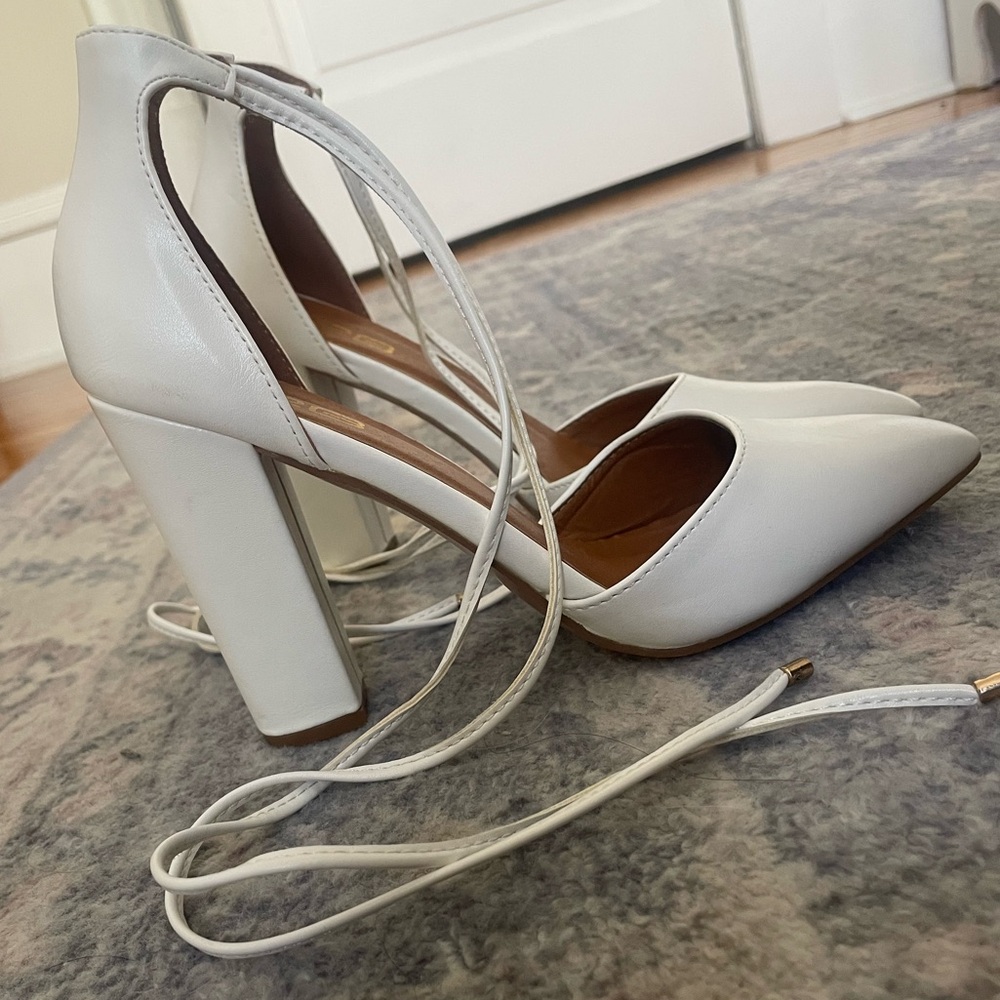 Pointed toe lace up heels